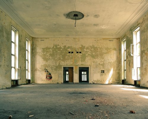 Abandoned factory interior with peeling paint